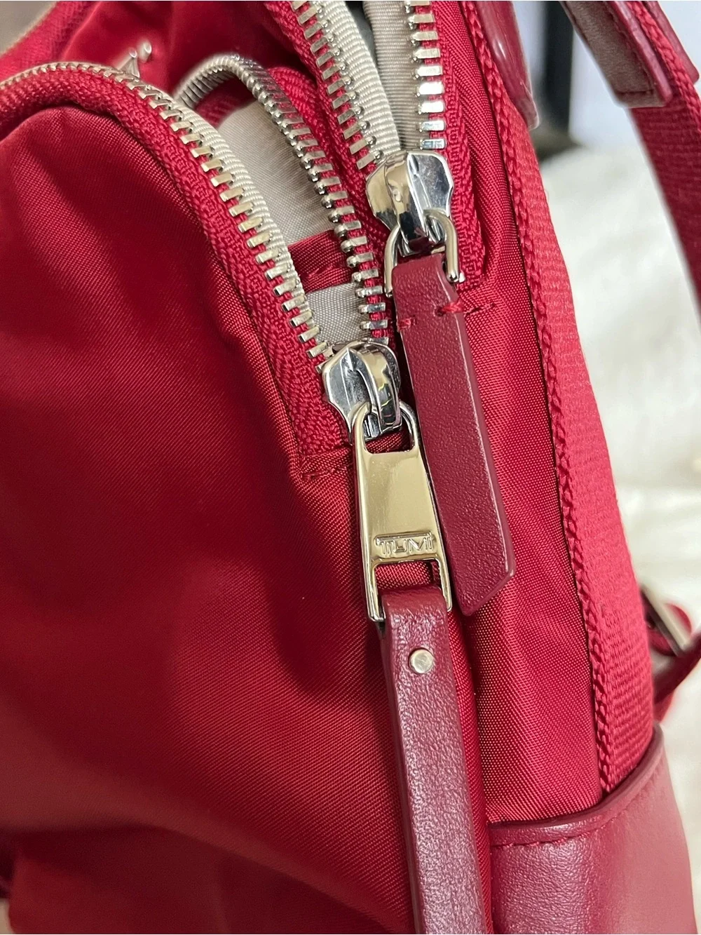 Tumi compact crossbody